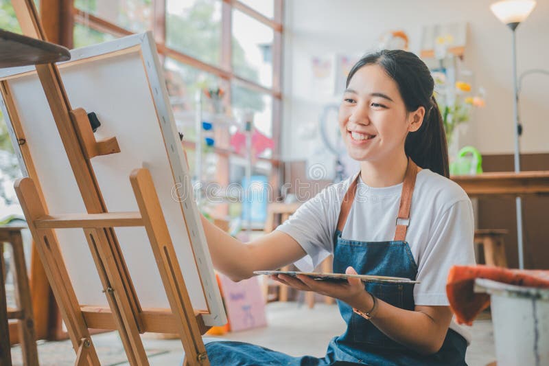 art student drawing watercolor painting canvas doing some projects studio workshop 400106469